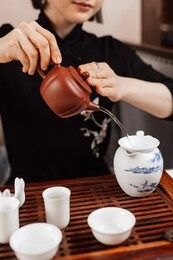 chinese tea ceremony. girl making chinese tea