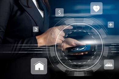 hand of woman using smartphone for select insurance technology (insurtech). insurance concept.