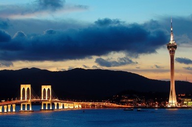 the evening of macau city from taipa island, china