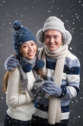 vertical portrait of a winter romantic couple in love 