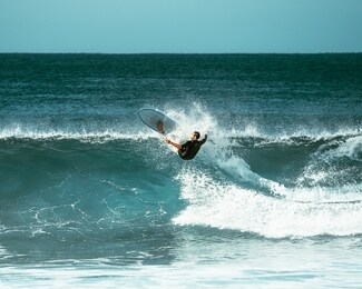 surfing in baja california sur, mexico 