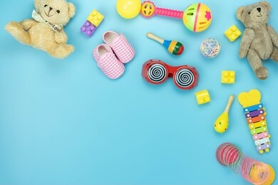 table top view decoration kid toys for develop background concept.flat lay accessories baby to play with items child on modern blue paper at office desk.copy space for add text.pastel tone wallpaper.