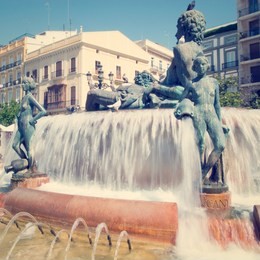 turia fountain in the plaza de la virgen valencia spain with retro effect