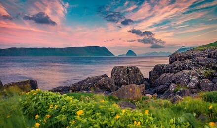 unbelievable summer sunrise on hestur island. splendid morning scvene of outskirts of kirkjubour village, faroe islands, denmark, europe.  beauty of nature concept background.