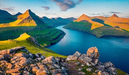 spectacular morning view from popular tourist destination - slettaratindur peak. colorful summer landscape of faroese fjords, funningur village. calm outdoor scene of faroe islands, denmark.