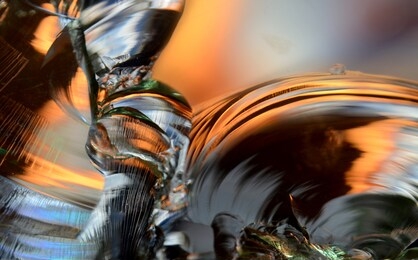 dark colored glass knot abstract photo background, orange and black curved lines background