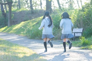 high school girl running in the park