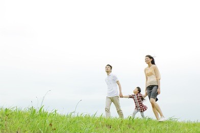 japanese family walking on the river bed