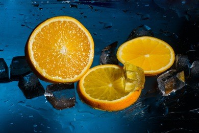 freshness orange and cristal cube of ice for preparation of