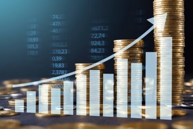financial growth. increasing stacks of golden coins with rising arrow symbolizing cryptocurrency money mining and profit over blue background