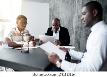 office meeting of black staff to discuss pressing issues before the working day.