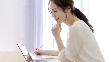 asian young woman working from home