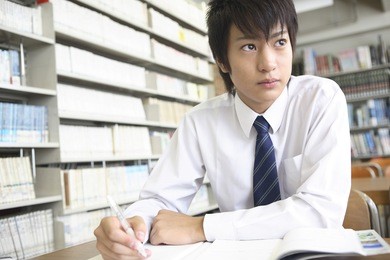  japanese male high school students studying in the library