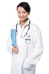 young female physician holding clipboard