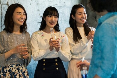 men and women participating in the machmaking party