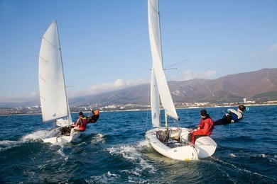 racing sailboat in the sea on a sunny day