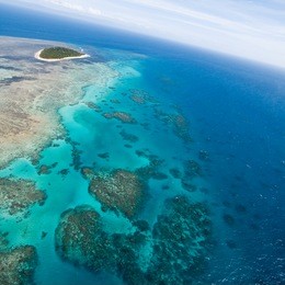 aerial view of great barrier reef with clear blue water, queensland, australia