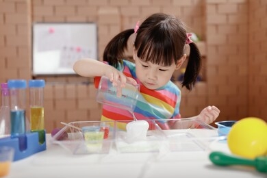 toddler girl  play science experiments for homeschooling 