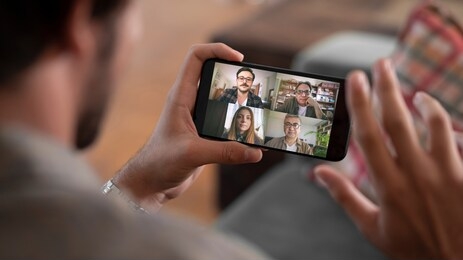 talking and working on mobile phone