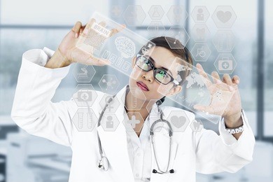 image of young woman doctor. concept of modern technology