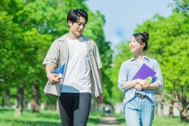 two youths walking while talking