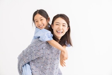 young asian mother and daughter