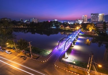 night view of iron bridge, chiang mai, thailand, long exposure 
