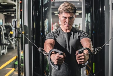 asian men exercise chest workout on bench press cable machine lifestyle of man for fitness health.metaphor fitness and workout concept exercise health lifestyle muscle body your health