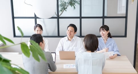 portrait of asian men and women chatting