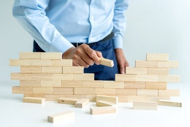 businessman use wood brick to make wall block it for idea for make business plan image.