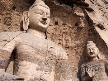 giant buddha statue at yungang grottoes in datong, shanxi province, china