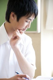 junior high-japanese boy listening to the lecture in the class