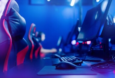 professional gamers cafe room with powerful personal computer game chair blue color. concept cyber sport arena.