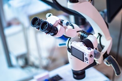 operating microscope with built-in camera. dental operating microscope. dental optics. dental equipment. dentistry. equipment for complex operations.