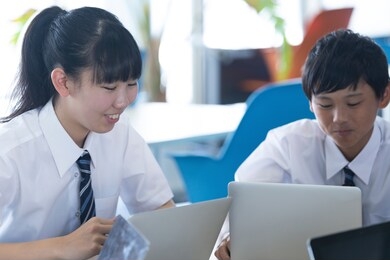 junior high school students doing group work