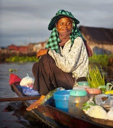 local cambodian seller in floating market, cambodia