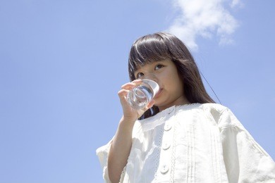 japanese girl drinking a glass of water