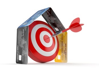 bull's eye inside house of credit cards isolated on white background. 3d illustration