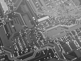 a shot of the back side of a new dual processor computer mother board.  this image is a nice background image for print material related to computer technology.