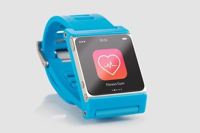 close up blue smart watch with fitness app icon on the screen 