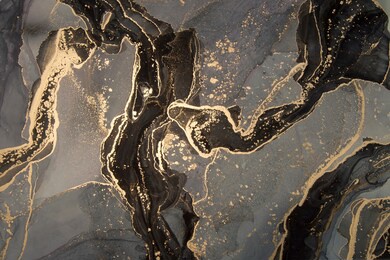 high resolution. luxury abstract fluid art painting in alcohol ink technique, mixture of black, gray and gold paints.  imitation of marble stone cut, glowing golden veins. tender and dreamy design. 
