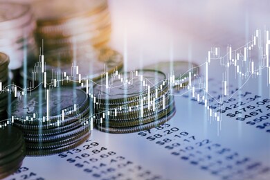 financial investment concept, double exposure of cstack of coins for finance investor