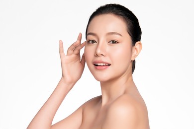 beautiful young asian woman with clean fresh skin on white background, face care, facial treatment, cosmetology, beauty and spa, asian women portrait