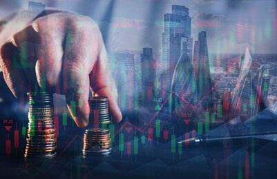 businessman holding coin with  graph. double exposure of financial graph and city.technical price candlestick chart graph and indicator stock online trading. forex investment business.