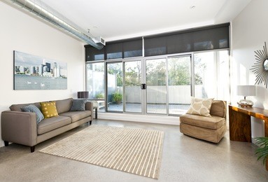 living room with sliding glass door to balcony - artwork from photographer portfolio