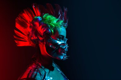 profile view portrait of cyberpunk woman with mohawk hairstyle and spiked mask.