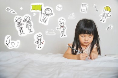 a little girl learning to write at home. children kids dream jobs diversity occupations concept. small kid and various drawings.