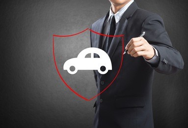 business man drawing shield protecting auto car, insurance concept