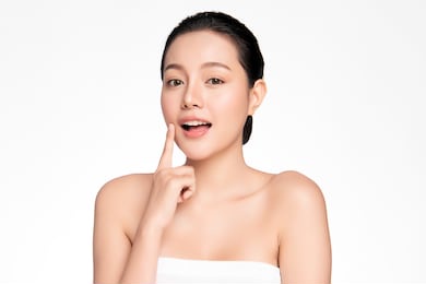 beautiful young asian woman with clean fresh skin on white background, face care, facial treatment, cosmetology, beauty and spa, asian women portrait