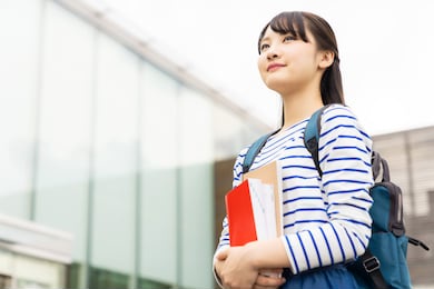 asian female student in school building.